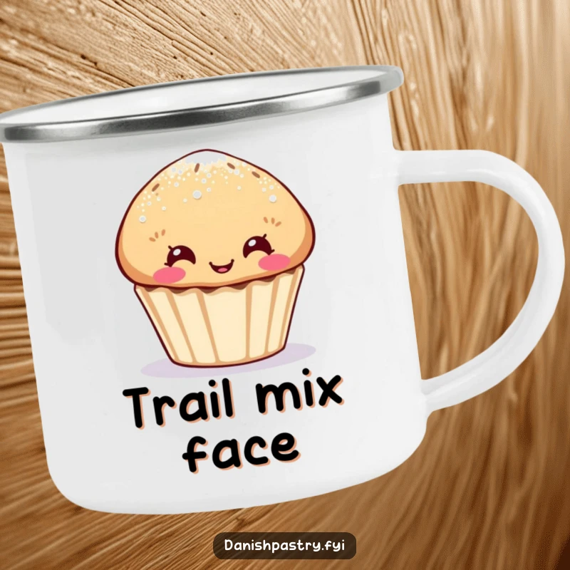 Funny muffin camping mug, sugar-dusted character making a funny face, durable and humorous for outdoor use.