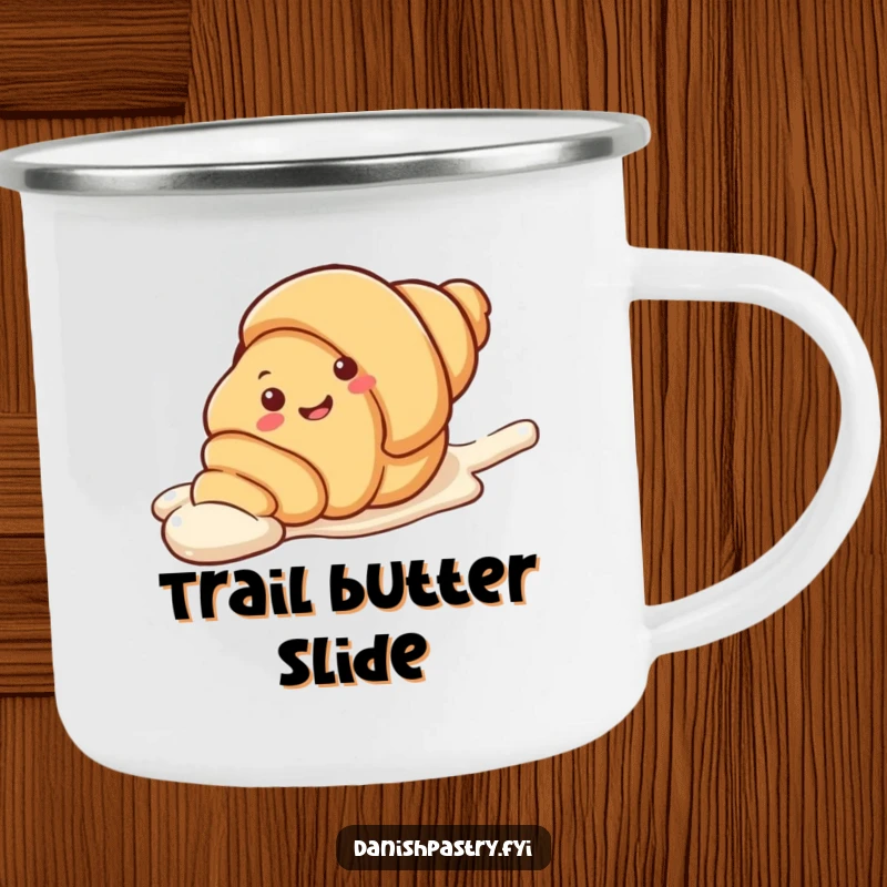 Funny Camping Mug depicting a smiling croissant character sliding playfully down an icing streak. A sweet and humorous mug for outdoor enthusiasts.