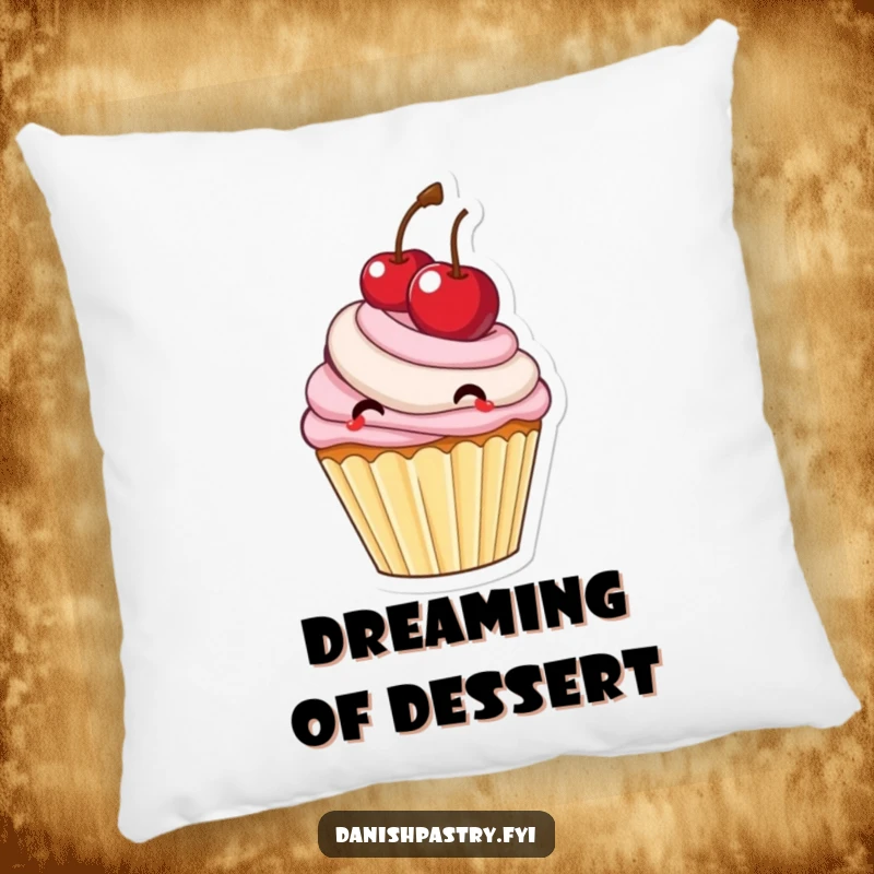 Funny cupcake with frosting bouncing a large cherry, a soft and decorative pillow with a sweet design.