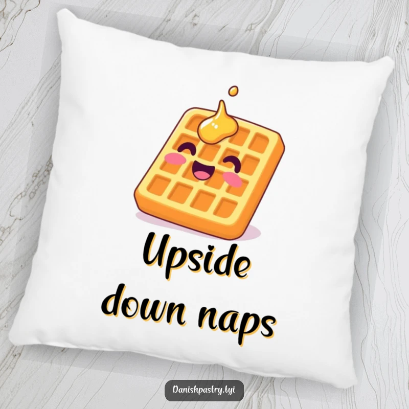 Funny waffle pillow showing a delighted character grinning upside down with syrup, offering sweet, humorous comfort.
