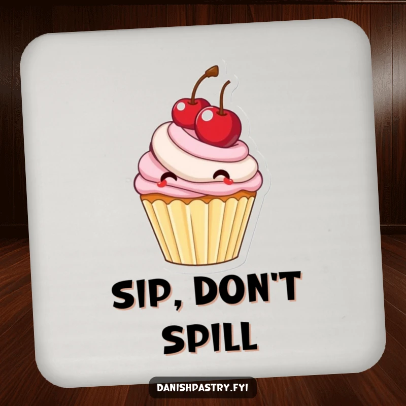 Funny cupcake with frosting bouncing a large cherry, a sweet and protective drink coaster.