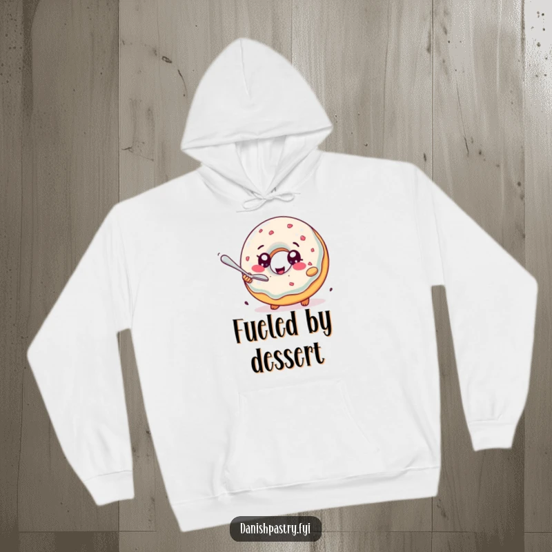 Funny Hoodie: A delighted jelly donut with sparkling eyes comically pursuing a tiny spoon, a warm and humorous apparel choice.