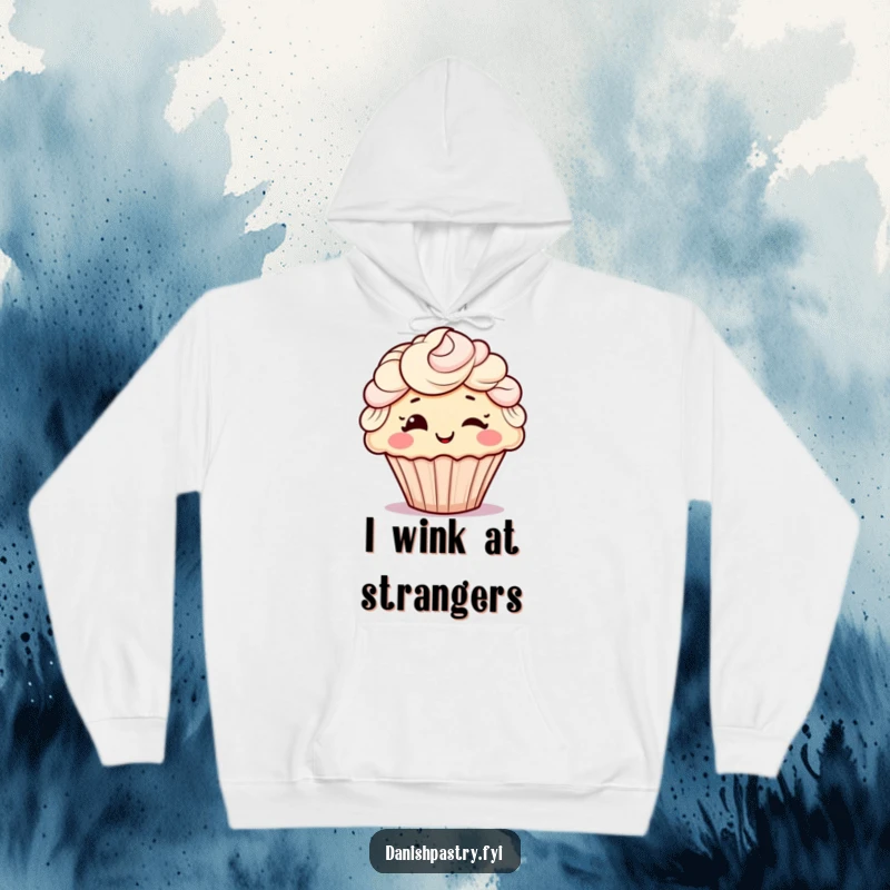 Funny hoodie showcasing a cheerful cupcake with swirly frosting hair giving a playful wink, a cozy and humorous apparel choice.