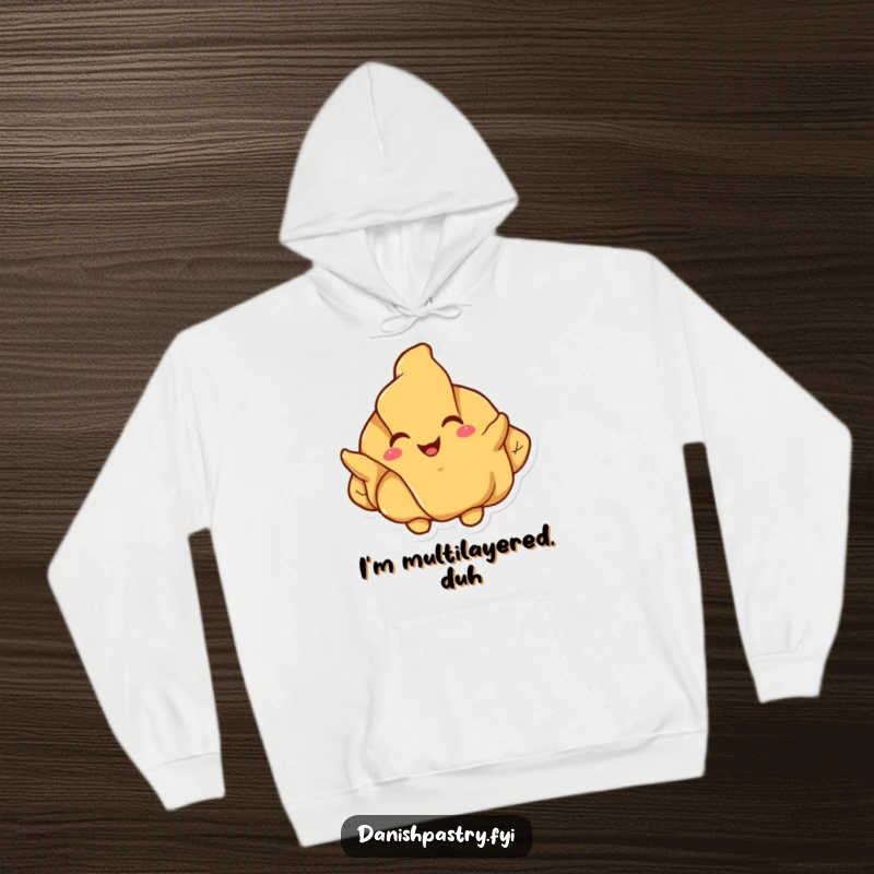 Funny croissant hoodie featuring a happy pastry character joyfully unfolding its flaky layers, perfect for cozy moments.