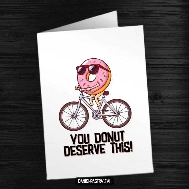 Funny Free Printable Congratulations Card: Donut with sunglasses rides icing bike, cheering you on.