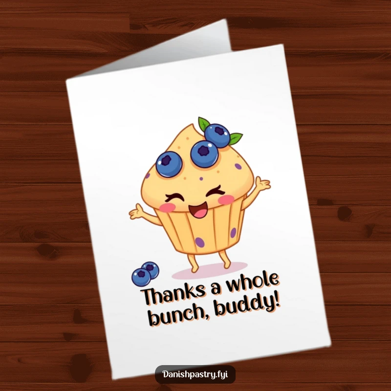 Funny Free Printable Thank You Card: A winking muffin dotted with blueberries performs a happy dance, expressing thanks with charm.