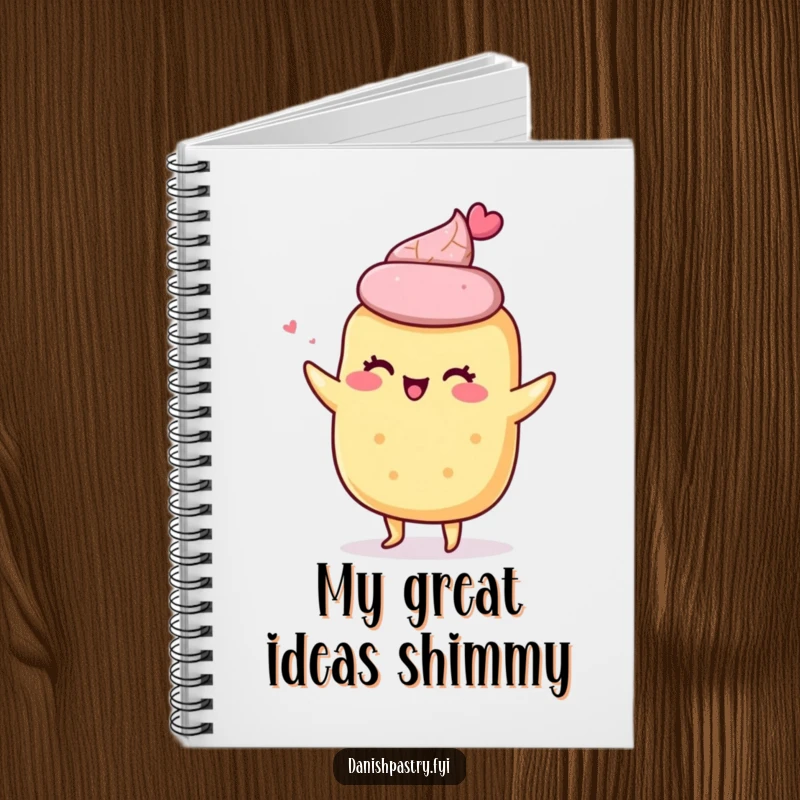 Funny notebook with a giddy scone character doing a little shimmy on the cover, ideal for jotting down ideas with a baking flair.