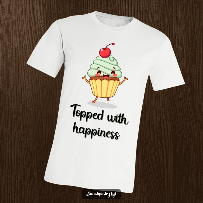 Funny t-shirt with a gleeful cupcake topped with a cherry, performing a cheerful little jig. Whimsical dessert character graphic.