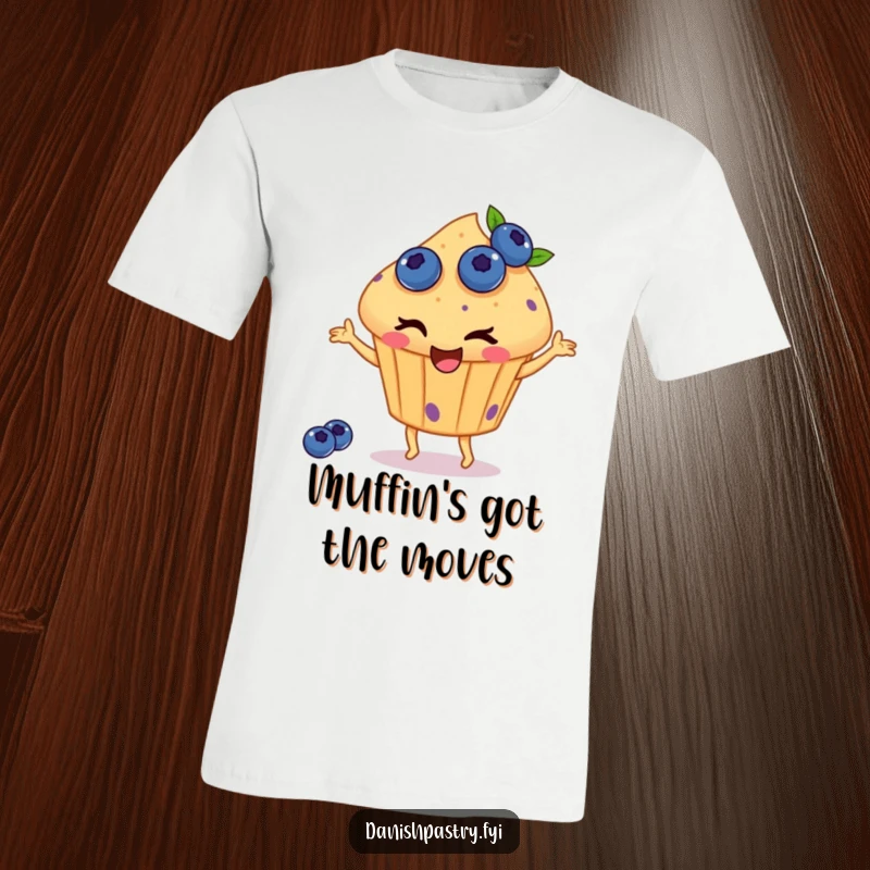 Funny t-shirt showcasing a winking muffin with blueberries, happily dancing with sheer delight, creating a whimsical and eye-catching food-themed statement.