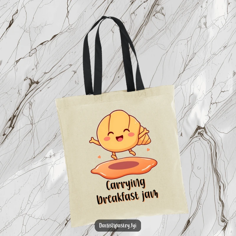 Funny tote bag showcasing a smiling croissant with legs, energetically jumping over a jam puddle. Cute and humorous pastry art.